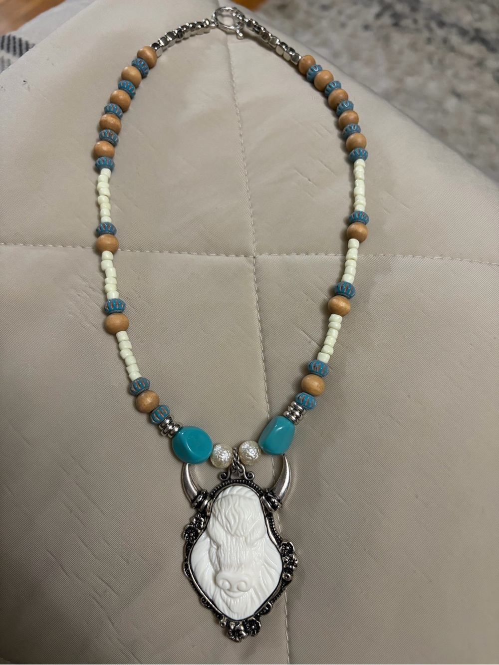 Boho Turquoise & Cream Carved Bull Pendant Necklace